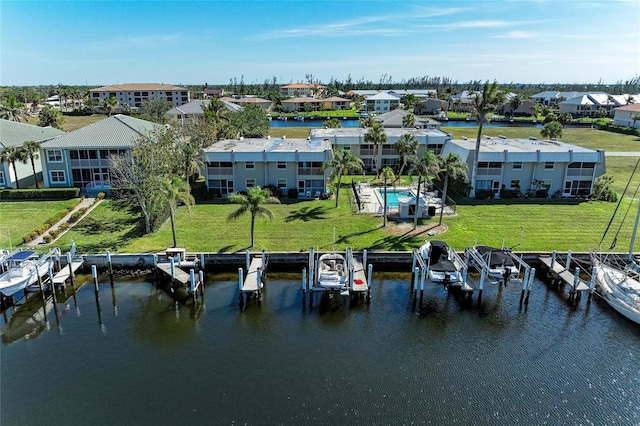 aerial view featuring a residential view and a water view