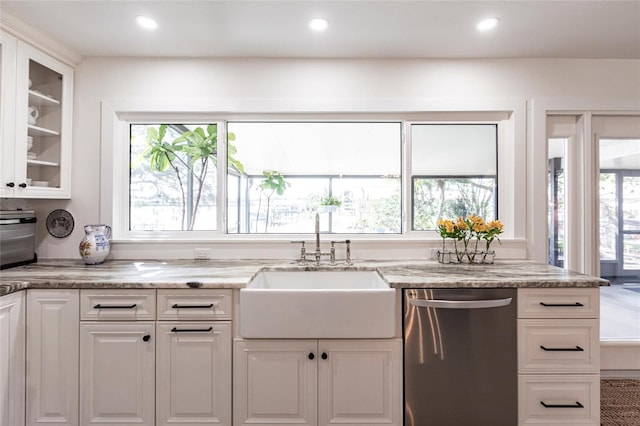 kitchen featuring a sink, glass insert cabinets, white cabinets, and dishwasher