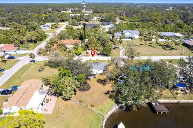 aerial view with a residential view and a water view