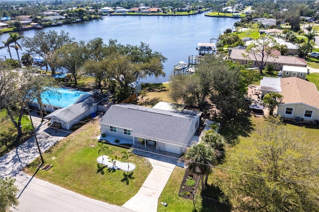 bird's eye view with a residential view and a water view