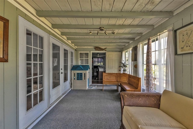 sunroom / solarium with beam ceiling and wooden ceiling