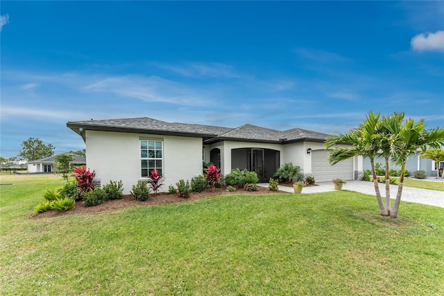 16265 Juarez Cir, Punta Gorda, FL 33955 - view of front of house with stucco siding, driveway, a front yard, and a garage