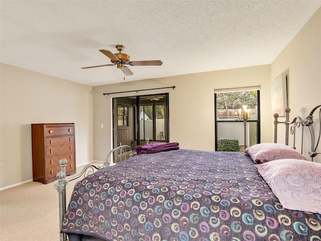 bedroom with light carpet, access to exterior, baseboards, and a ceiling fan