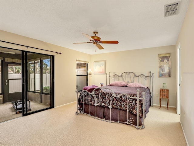 bedroom with access to outside, visible vents, baseboards, and light colored carpet