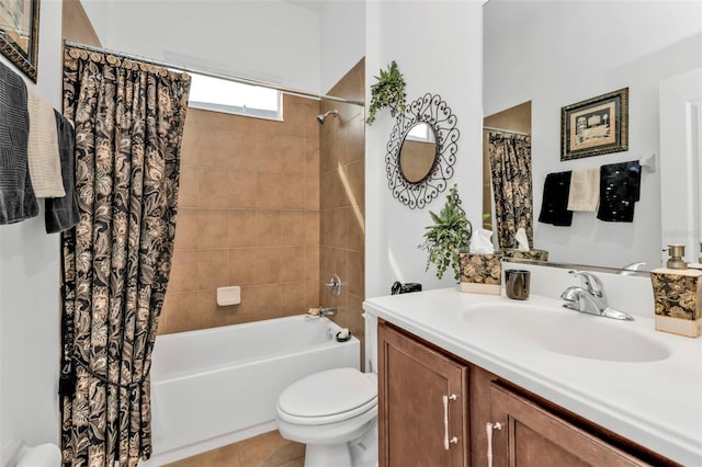 full bath featuring toilet, tile patterned flooring, shower / bath combination with curtain, and vanity