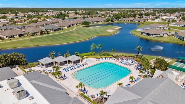 bird's eye view featuring a water view and a residential view