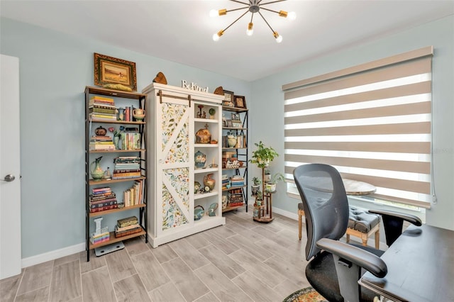 21287 Gertrude Ave Unit 106, Port Charlotte, FL 33952 - home office featuring baseboards, wood finish floors, and a notable chandelier