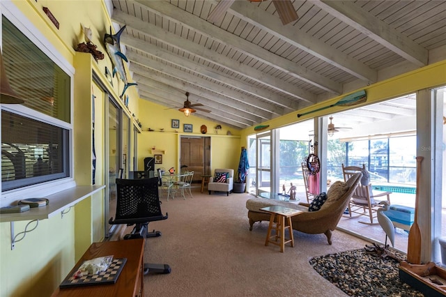 sunroom / solarium with vaulted ceiling with beams, wooden ceiling, and ceiling fan