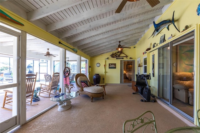 sunroom with wood ceiling, vaulted ceiling with beams, and ceiling fan