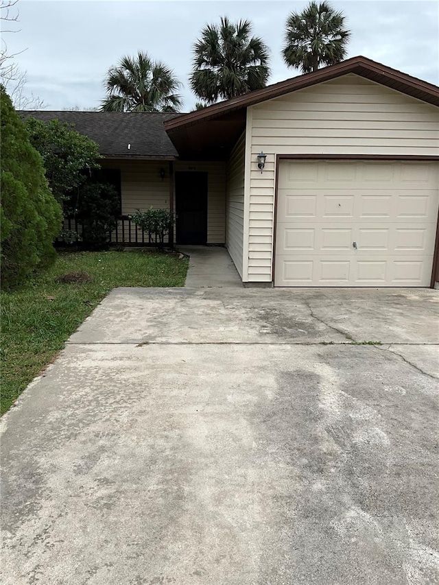 ranch-style home with a garage