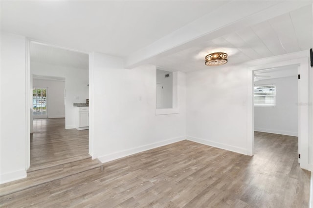 23475 Harper Ave, Port Charlotte, FL 33980 - empty room with light wood-type flooring and baseboards
