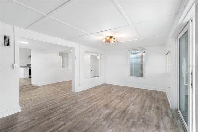 23475 Harper Ave, Port Charlotte, FL 33980 - spare room with wood finished floors and baseboards