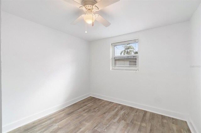 23475 Harper Ave, Port Charlotte, FL 33980 - unfurnished room featuring light wood-type flooring and baseboards