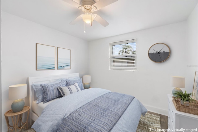 23475 Harper Ave, Port Charlotte, FL 33980 - bedroom featuring wood finished floors, baseboards, and ceiling fan