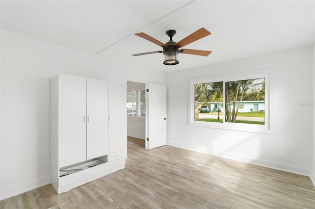 23475 Harper Ave, Port Charlotte, FL 33980 - spare room with light wood-type flooring, baseboards, and ceiling fan