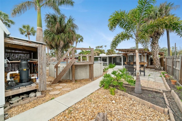 23475 Harper Ave, Port Charlotte, FL 33980 - fenced backyard featuring a patio area
