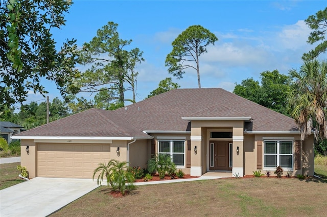 view of front facade featuring an attached garage, a shingled roof, concrete driveway, stucco siding, and a front lawn