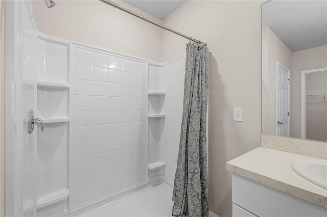 full bath featuring curtained shower and vanity