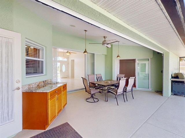 dining space featuring plenty of natural light and a ceiling fan