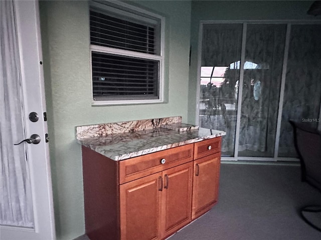 bathroom with a stall shower and vanity