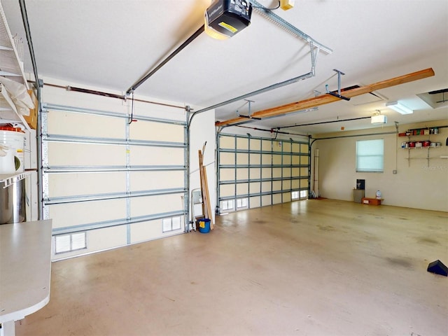 garage featuring a garage door opener