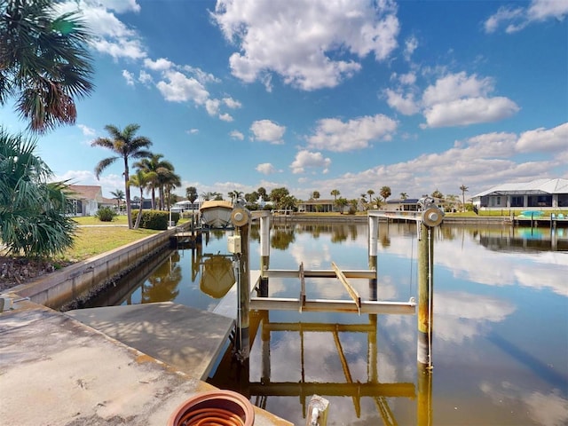 dock area featuring a water view