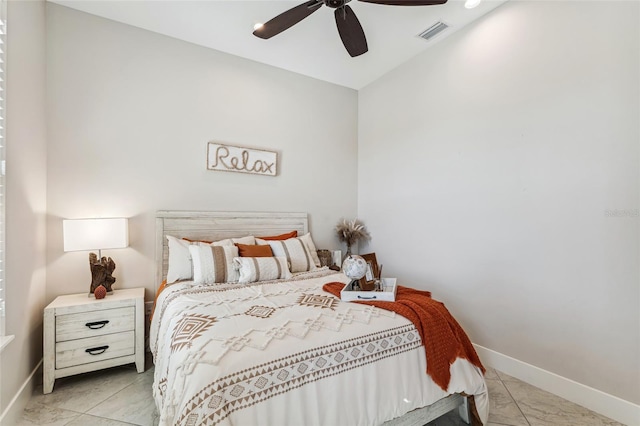 bedroom featuring a ceiling fan, visible vents, and baseboards