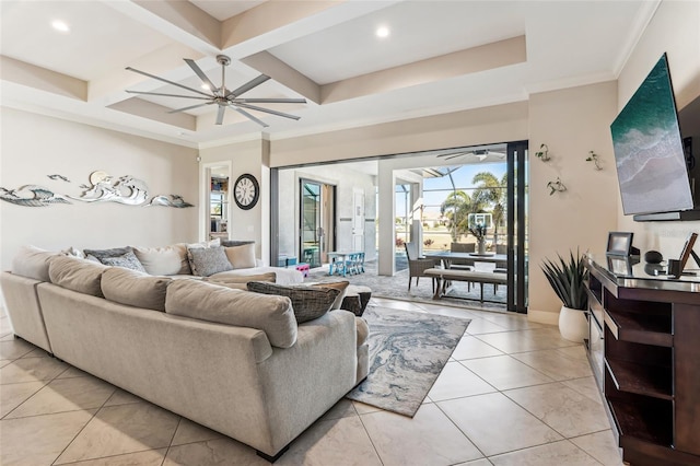 living room with light tile patterned floors, coffered ceiling, a ceiling fan, beam ceiling, and crown molding