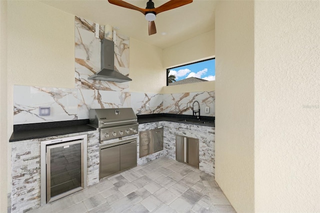 view of patio with sink, an outdoor kitchen, and a grill