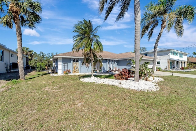 view of front of home with a front lawn