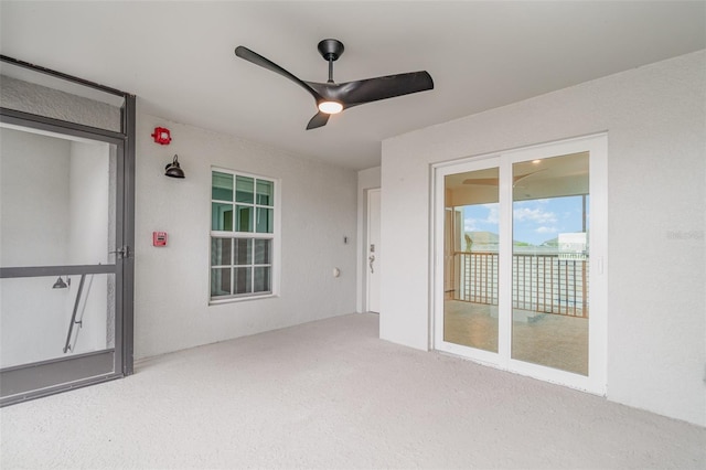 interior space featuring ceiling fan