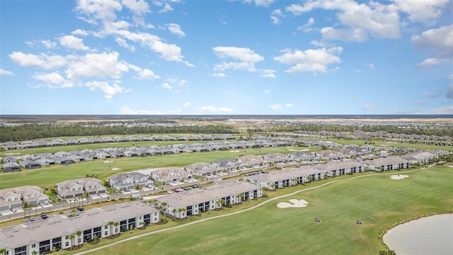 bird's eye view featuring golf course view and a residential view