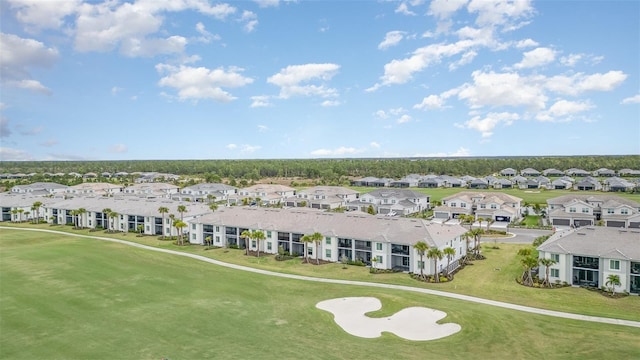 birds eye view of property with a residential view