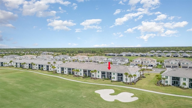 aerial view featuring a residential view and view of golf course