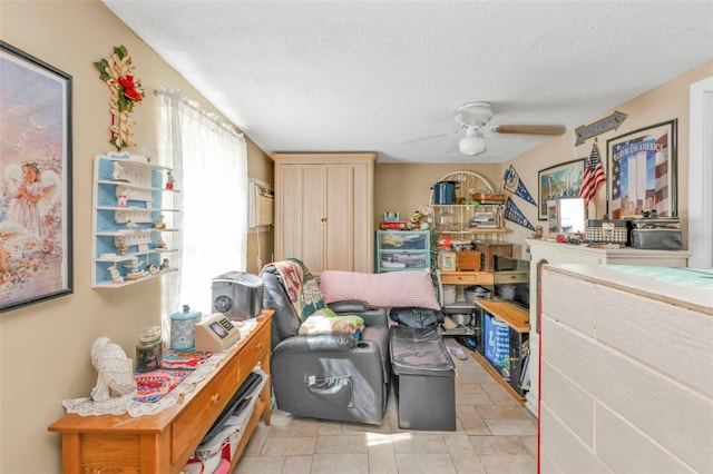 interior space featuring ceiling fan