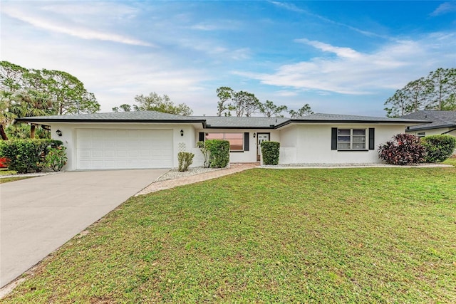 1052 Hinton St, Port Charlotte, FL 33952 - ranch-style house with stucco siding, an attached garage, concrete driveway, and a front yard