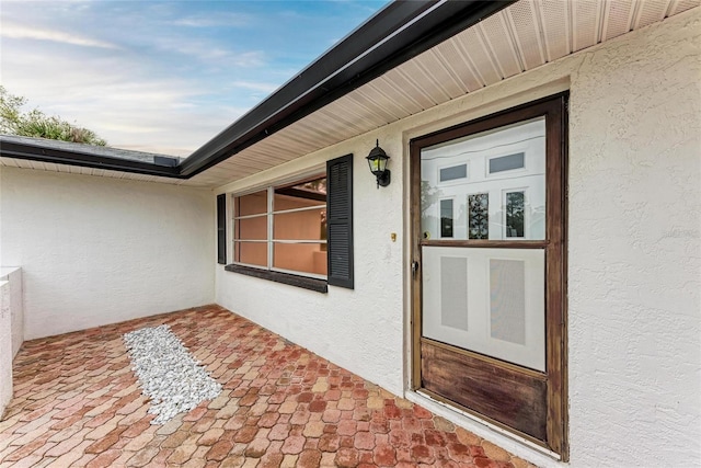1052 Hinton St, Port Charlotte, FL 33952 - property entrance with stucco siding