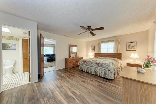1052 Hinton St, Port Charlotte, FL 33952 - bedroom with multiple windows, a textured ceiling, a ceiling fan, and wood finished floors