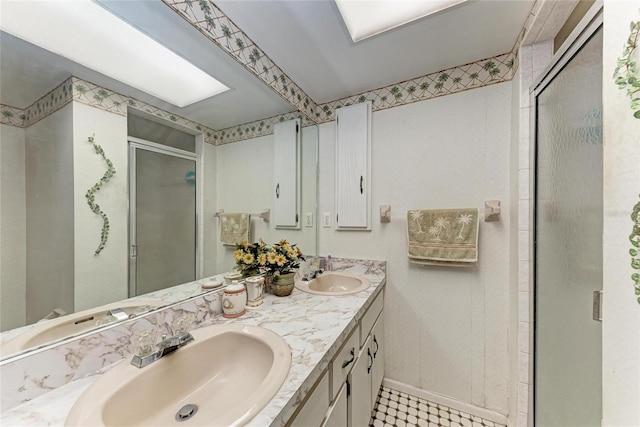 1052 Hinton St, Port Charlotte, FL 33952 - bathroom with double vanity, a stall shower, and a sink