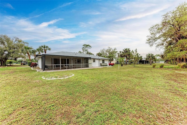 1052 Hinton St, Port Charlotte, FL 33952 - view of yard with a sunroom