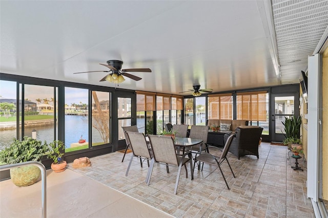 611 Bal Harbor Blvd, Punta Gorda, FL 33950 - sunroom / solarium with a water view, plenty of natural light, and ceiling fan