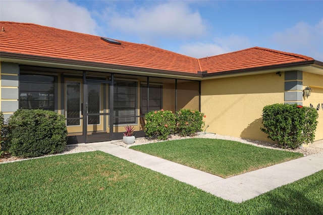 611 Bal Harbor Blvd, Punta Gorda, FL 33950 - exterior space featuring a yard, stucco siding, and a tile roof