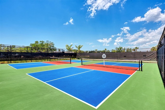 3 Bermuda Cir Unit 49, Englewood, FL 34223 - view of tennis court featuring community basketball court