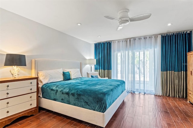 bedroom featuring wood finish floors and recessed lighting