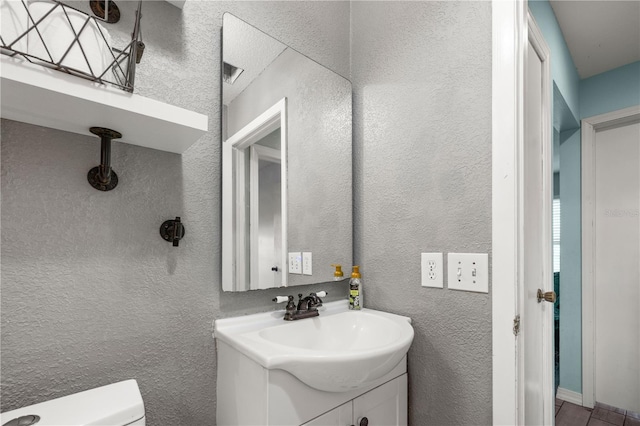 3265 Sunrise Trl, Port Charlotte, FL 33952 - half bathroom with vanity and a textured wall
