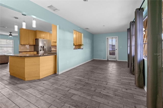 3265 Sunrise Trl, Port Charlotte, FL 33952 - kitchen featuring stainless steel refrigerator with ice dispenser, open floor plan, dark wood-type flooring, and a ceiling fan