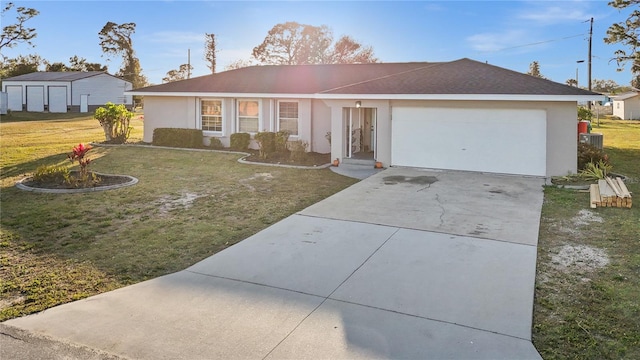3265 Sunrise Trl, Port Charlotte, FL 33952 - single story home featuring an attached garage, driveway, a front yard, and stucco siding