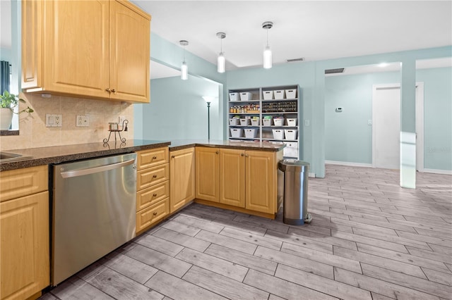 3265 Sunrise Trl, Port Charlotte, FL 33952 - kitchen with dishwasher, a peninsula, light brown cabinetry, decorative backsplash, and wood tiled floors