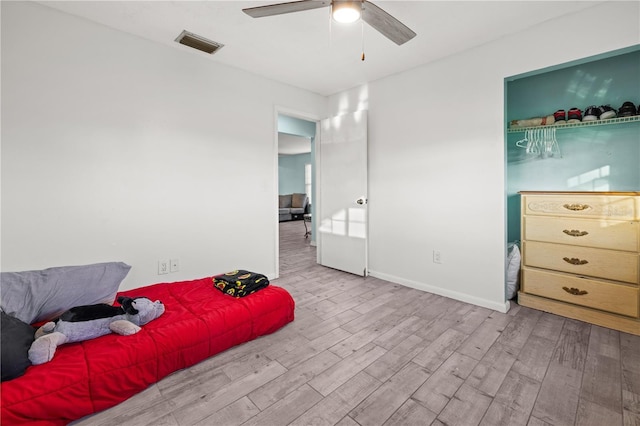 3265 Sunrise Trl, Port Charlotte, FL 33952 - bedroom with wood finished floors and ceiling fan