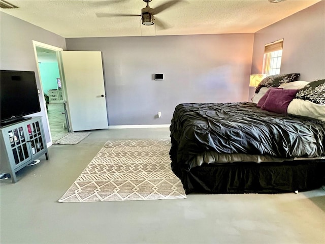 3265 Sunrise Trl, Port Charlotte, FL 33952 - bedroom featuring finished concrete floors, ceiling fan, and a textured ceiling